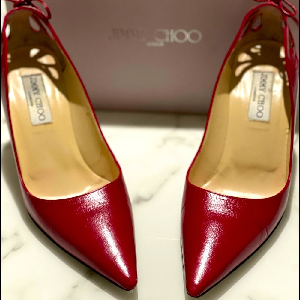 Jimmy Choo red pumps